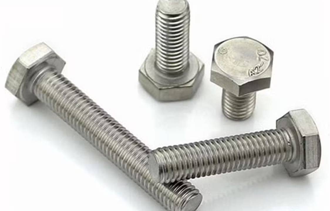 High tensile machine bolt manufactured by Dalloyed in a construction setting.