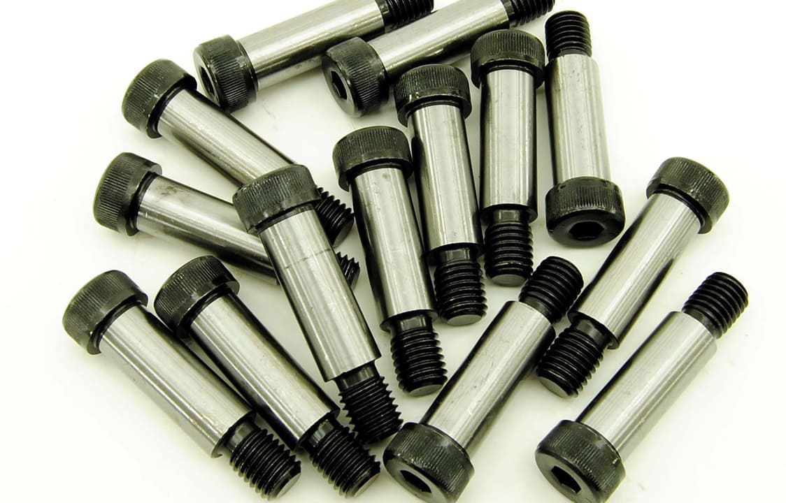 High tensile machine bolt manufactured by Dalloyed in a construction setting.